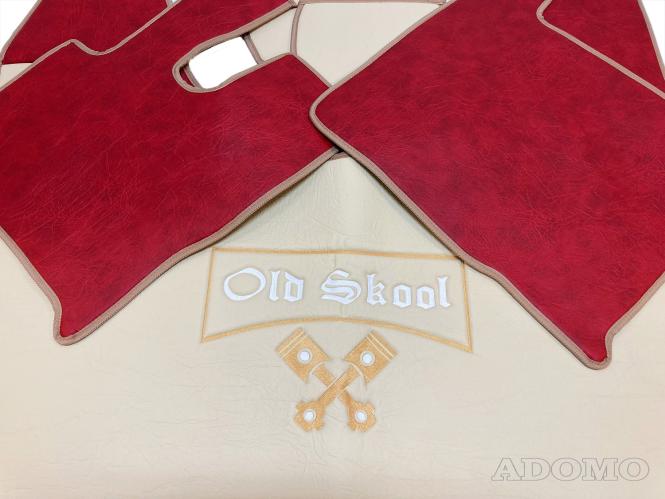 Kunstlederfußmatten mit Sitzsockel für DAF XF 106 ab 07/2017 rot - beige - glatt, großes Logo 