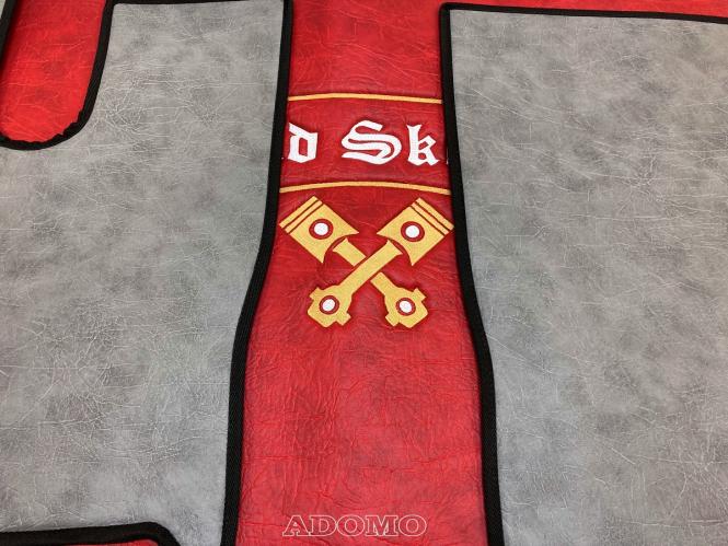 Kunstlederfußmatten mit Sitzsockel für DAF XF 106 ab 07/2017 grau - rot - glatt, großes Logo 